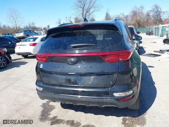 2021 Kia Sportage S with VIN KNDP6CACXM7867510, listed as a IAAI auction lot 41740288 with 64,198 mi miles. Bid and sale history available at carsss.com. Image 16.