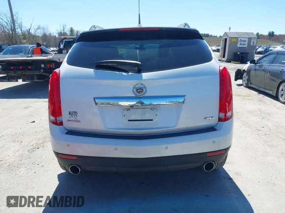 2013 Cadillac SRX Performance Collection with VIN 3GYFNDE33DS637155, listed as a IAAI auction lot 41977706 with 140,668 mi miles and . Bid and sale history available at DreamBid. Image 16.