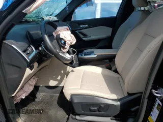 2023 BMW X1 xDrive28i with VIN WBX73EF08P5X85250, listed as a Copart auction lot 50158565 with 7,312 mi miles and Salvage Title. Bid and sale history available at DreamBid. Image 7.