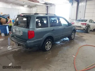 2005 Honda Pilot EX-L with VIN 2HKYF18545H504245, listed as a IAAI auction lot 41715449 with 236,985 mi miles. Bid and sale history available at carsss.com. Image 4.