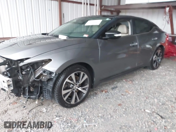 2016 Nissan Maxima SL with VIN 1N4AA6AP2GC379971, listed as a IAAI auction lot 41712080 with 192,382 mi miles and . Bid and sale history available at DreamBid. Image 2.