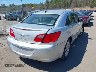 2010 Chrysler Sebring Limited with VIN 1C3CC5FB1AN203515, listed as a IAAI auction lot 42063786 with 171,035 mi miles and . Bid and sale history available at DreamBid. Image 4.
