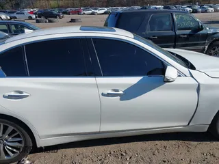 2019 Infiniti Q50 Luxe with VIN JN1EV7AR5KM594323, listed as a IAAI auction lot 42011023 with 68,235 mi miles and . Bid and sale history available at DreamBid. Image 13.