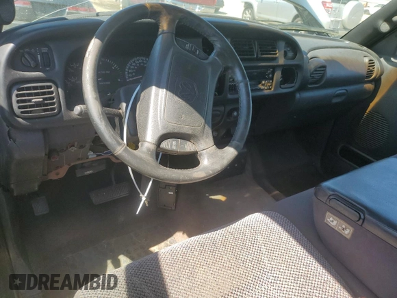 2002 Dodge Ram 2500 with VIN 3B7KC236X2M268324, listed as a Copart auction lot 57196344 with 179,647 mi miles and Salvage Title. Bid and sale history available at carsss.com. Image 8.