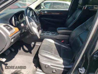 2011 Jeep Grand Cherokee Limited with VIN 1J4RR5GT2BC677640, listed as a Copart auction lot 68012754 with 138,208 mi miles and Salvage title. Bid and sale history available at DreamBid. Image 7.