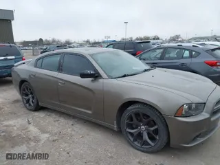 2011 Dodge Charger Rallye with VIN 2B3CL3CG6BH520184, listed as a IAAI auction lot 41767834 with 158,757 mi miles. Bid and sale history available at carsss.com. Image 1.