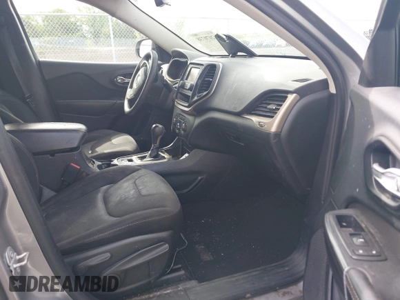 2016 Jeep Cherokee Sport with VIN 1C4PJLAB0GW207556, listed as a IAAI auction lot 42070738 with 218,142 mi miles and . Bid and sale history available at DreamBid. Image 5.