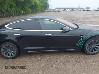 2018 Tesla Model S 75D with VIN 5YJSA1E21JF283971, listed as a IAAI auction lot 42507010 with 117,934 mi miles and . Bid and sale history available at DreamBid. Image 14.