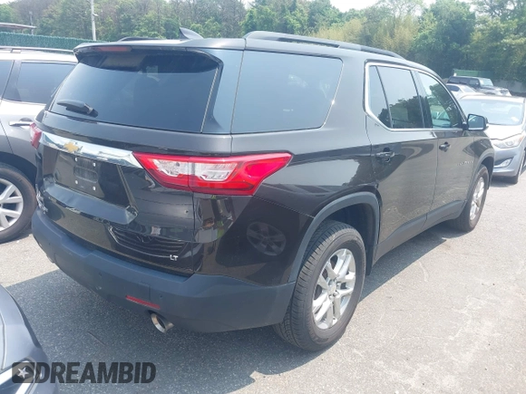 2019 Chevrolet Traverse LT Cloth z VIN 1GNEVGKW3KJ102804, wystawiony jako IAAI lot #42492949 z przebiegiem 144 895 mil mil oraz . Historia ofert i sprzedaży dostępna na DreamBid. Obrazek 4.