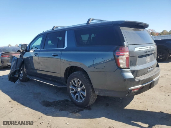 2021 Chevrolet Suburban LT with VIN 1GNSKCKD4MR482940, listed as a Copart auction lot 77072314 with 61,739 mi miles and Salvage Title. Bid and sale history available at carsss.com. Image 2.