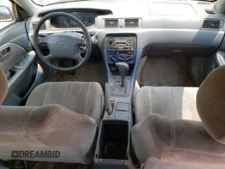 1999 Toyota Camry LE z VIN JT2BF22K5X0208248, wystawiony jako Copart lot #59916165 z przebiegiem 329 883 mil mil oraz Szkoda całkowita • Salvage title. Historia ofert i sprzedaży dostępna na DreamBid. Obrazek 8.