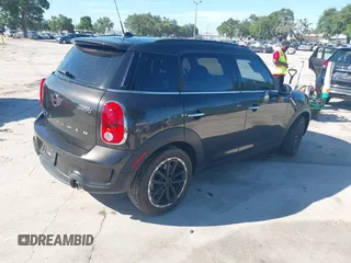 2015 MINI Countryman S with VIN WMWZC3C58FWT04316, listed as a IAAI auction lot 42525698 with 97,046 mi miles and . Bid and sale history available at DreamBid. Image 4.