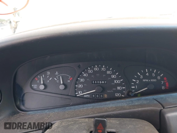 2002 Ford Escort ZX2 Standard z VIN 3FAFP11382R230057, wystawiony jako IAAI lot #42338923 z przebiegiem 111 587 mil mil oraz . Historia ofert i sprzedaży dostępna na DreamBid. Obrazek 7.