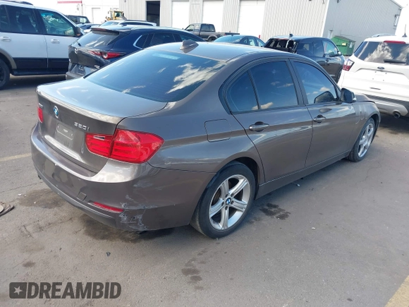 2014 BMW 3 Series 320i xDrive with VIN WBA3C3C58EF983816, listed as a IAAI auction lot 41949430 with 111,627 mi miles. Bid and sale history available at carsss.com. Image 4.