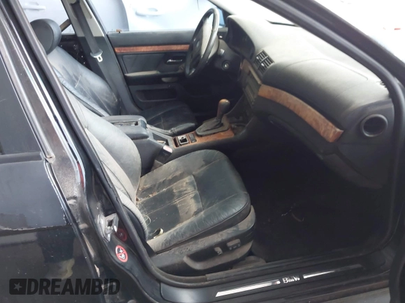 1998 BMW 5 Series 528i z VIN WBADD6325WBW34033, wystawiony jako IAAI lot #41025167 z przebiegiem Nie podano mil oraz . Historia ofert i sprzedaży dostępna na DreamBid. Obrazek 5.