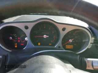 2003 Nissan 350Z Touring z VIN JN1AZ34E73T016672, wystawiony jako Copart lot #52968375 z przebiegiem 125 844 mil mil oraz Szkoda całkowita • Salvage title. Historia ofert i sprzedaży dostępna na DreamBid. Obrazek 9.
