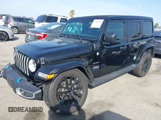 2023 Jeep Wrangler Sahara with VIN 1C4JJXP67PW556933, listed as a IAAI auction lot 41587035 with 20,463 mi miles and . Bid and sale history available at DreamBid. Image 19.