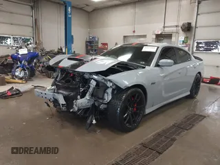 2021 Dodge Charger Scat Pack Widebody with VIN 2C3CDXGJ4MH540627, listed as a IAAI auction lot 41171991 with 31,394 mi miles and . Bid and sale history available at DreamBid. Image 6.