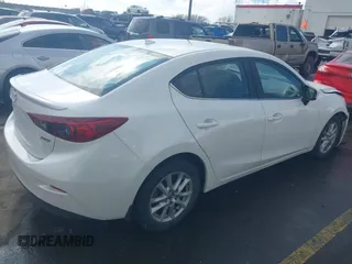 2014 Mazda 3 i Grand Touring with VIN JM1BM1W71E1209014, listed as a IAAI auction lot 41636308 with 218,277 mi miles and . Bid and sale history available at carsss.com. Image 4.