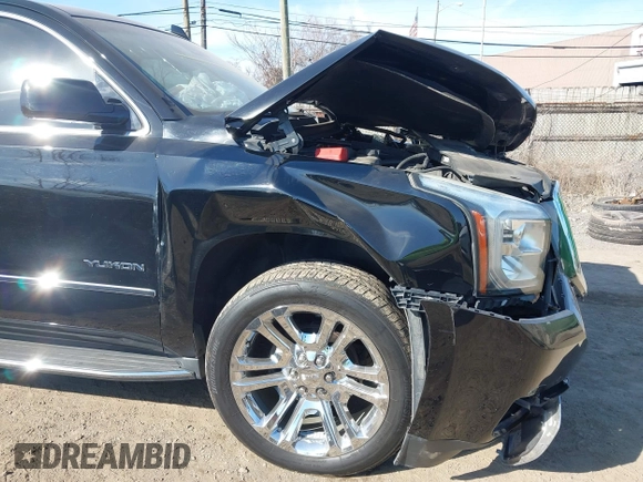 2016 GMC Yukon SLT with VIN 1GKS2BKC5GR253038, listed as a IAAI auction lot 41790030 with 101,039 mi miles. Bid and sale history available at carsss.com. Image 6.