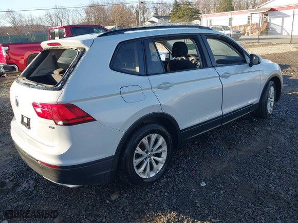 2018 Volkswagen Tiguan S with VIN 3VV1B7AX2JM066312, listed as a IAAI auction lot 41641390 with 133,000 mi miles. Bid and sale history available at carsss.com. Image 4.