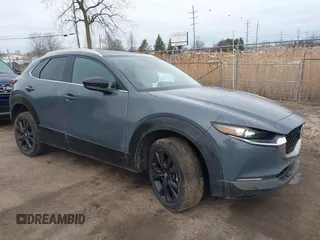 2023 Mazda CX-30 S Preferred z VIN 3MVDMBCM5PM532978, wystawiony jako IAAI lot #41688864 z przebiegiem 32 900 mil mil oraz . Historia ofert i sprzedaży dostępna na DreamBid. Obrazek 1.