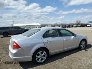 2012 Ford Fusion SE with VIN 3FAHP0HG1CR340168, listed as a Copart auction lot 52154405 with 167,850 mi miles and Salvage Title. Bid and sale history available at DreamBid. Image 3.