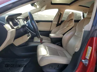 2017 Tesla Model S 60 with VIN 5YJSA1E15HF210006, listed as a Copart auction lot 85096644 with 225,497 mi miles and Salvage title. Bid and sale history available at DreamBid. Image 7.