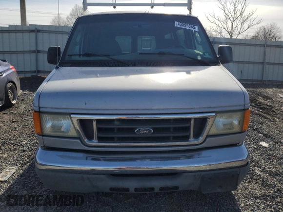 2005 Ford Econoline Passenger XL with VIN 1FBNE31LX5HA76002, listed as a Copart auction lot 43599865 with 198,749 mi miles and Salvage Title. Bid and sale history available at carsss.com. Image 5.