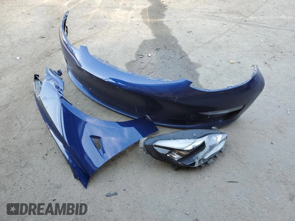 2020 Tesla Model 3 Standard Range Plus with VIN 5YJ3E1EA7LF705907, listed as a Copart auction lot 48765145 with 104,479 mi miles and Salvage Title. Bid and sale history available at DreamBid. Image 14.