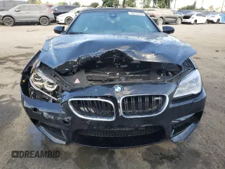 2016 BMW M6 z VIN WBS6G9C57GD932144, wystawiony jako Copart lot #72273744 z przebiegiem 71 614 mil mil oraz Szkoda całkowita • Salvage title. Historia ofert i sprzedaży dostępna na DreamBid. Obrazek 5.