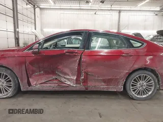 2014 Ford Fusion SE Hybrid with VIN 3FA6P0LU5ER136237, listed as a IAAI auction lot 41590088 with 174,009 mi miles. Bid and sale history available at carsss.com. Image 14.