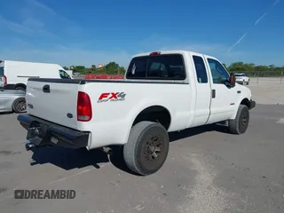2003 Ford F-350 XL with VIN 1FTSX31P23EC84854, listed as a IAAI auction lot 41703796 with 208,911 mi miles and . Bid and sale history available at DreamBid. Image 4.