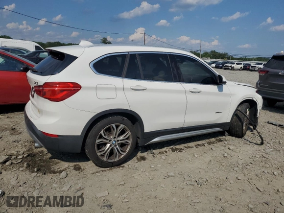 2017 BMW X1 xDrive28i z VIN WBXHT3C35H5F86099, wystawiony jako Copart lot #60196275 z przebiegiem 61 117 mil mil oraz Szkoda całkowita • Salvage title. Historia ofert i sprzedaży dostępna na DreamBid. Obrazek 3.