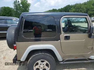 2004 Jeep Wrangler SE with VIN 1J4FA29164P797604, listed as a Copart auction lot 59978155 with 166,888 mi miles and Clean title. Bid and sale history available at DreamBid. Image 10.