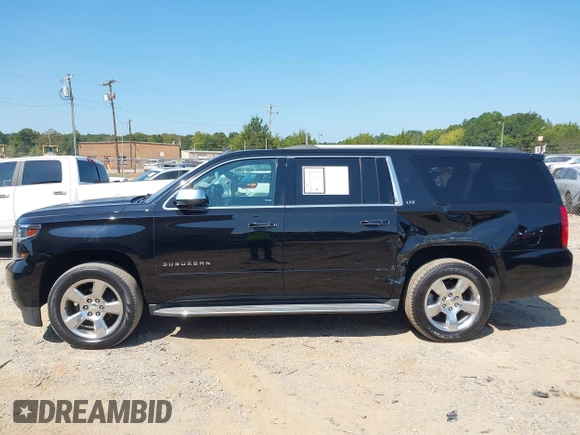 2015 Chevrolet Suburban LTZ with VIN 1GNSKKKC7FR205638, listed as a IAAI auction lot 40284367 with 103,530 mi miles and . Bid and sale history available at DreamBid. Image 14.
