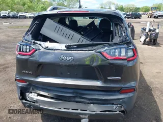 2019 Jeep Cherokee Latitude Plus с VIN 1C4PJMLB6KD355718, выставлен на аукционе IAAI как лот 42209813 с пробегом 101 773 миль миль и . История ставок и продаж доступна на DreamBid. Изображение 16.