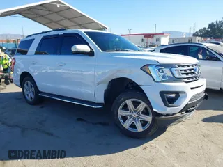 2019 Ford Expedition XLT with VIN 1FMJU1JT4KEA31874, listed as a IAAI auction lot 41663928 with 119,058 mi miles. Bid and sale history available at carsss.com. Image 1.