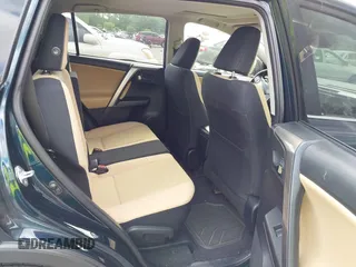 2018 Toyota RAV4 XLE with VIN JTMWFREV9JJ165655, listed as a IAAI auction lot 42138998 with 123,569 mi miles and . Bid and sale history available at carsss.com. Image 8.