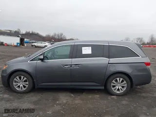 2016 Honda Odyssey SE with VIN 5FNRL5H3XGB150025, listed as a IAAI auction lot 41857704 with 69,515 mi miles. Bid and sale history available at carsss.com. Image 14.