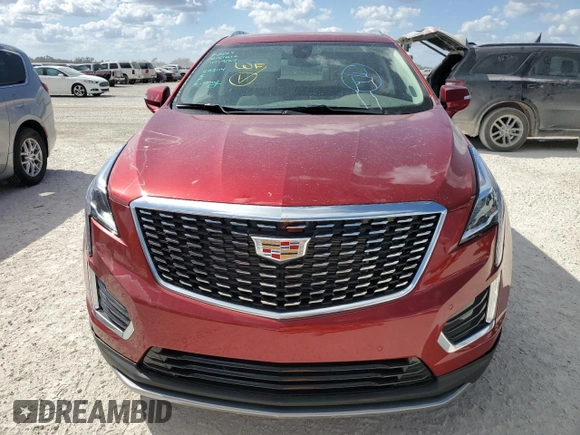 2024 Cadillac XT5 FWD Premium Luxury with VIN 1GYKNCRS3RZ737955, listed as a Copart auction lot 77241674 with 0 mi miles and Salvage Title. Bid and sale history available at carsss.com. Image 5.