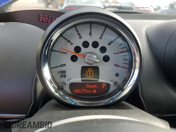 2013 MINI Paceman z VIN WMWSS1C58DWN93901, wystawiony jako Copart lot #77044034 z przebiegiem 189 375 mil mil oraz Czysty tytuł • Clean title. Historia ofert i sprzedaży dostępna na DreamBid. Obrazek 9.