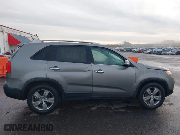 2013 Kia Sorento EX with VIN 5XYKUDA64DG320588, listed as a IAAI auction lot 41204828 with 164,146 mi miles. Bid and sale history available at carsss.com. Image 13.