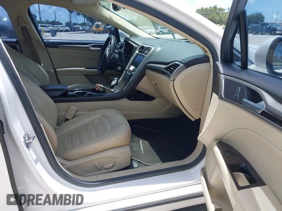 2013 Ford Fusion SE Hybrid с VIN 3FA6P0LU8DR161132, выставлен на аукционе IAAI как лот 42646879 с пробегом 178 516 миль миль и . История ставок и продаж доступна на DreamBid. Изображение 5.
