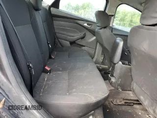 2016 Ford Focus SE z VIN 1FADP3F24GL313333, wystawiony jako Copart lot #60023715 z przebiegiem Nie podano mil oraz Szkoda całkowita • Salvage title. Historia ofert i sprzedaży dostępna na DreamBid. Obrazek 10.