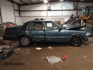 2008 Mercury Grand Marquis GS with VIN 2MEFM74V08X664002, listed as a IAAI auction lot 41610592 with Not Provided miles and . Bid and sale history available at DreamBid. Image 14.