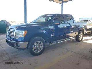 2012 Ford F-150 XL with VIN 1FTFW1ET5CFA72654, listed as a Copart auction lot 41878765 with 214,439 mi miles and Salvage Title. Bid and sale history available at carsss.com. Image 1.