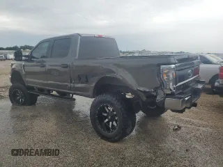 2018 Ford F-250 XL with VIN 1FT7W2B65JEB83300, listed as a Copart auction lot 55920255 with 104,125 mi miles and Salvage title. Bid and sale history available at DreamBid. Image 2.