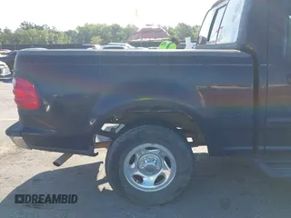 2001 Ford F-150 XLT z VIN 1FTRW07L61KC53030, wystawiony jako IAAI lot #42526499 z przebiegiem 121 675 mil mil oraz . Historia ofert i sprzedaży dostępna na DreamBid. Obrazek 15.