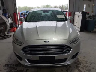 2013 Ford Fusion SE Hybrid with VIN 3FA6P0LU2DR319335, listed as a IAAI auction lot 42007573 with 135,099 mi miles. Bid and sale history available at carsss.com. Image 12.